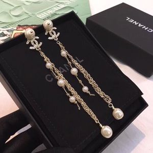 chanel pearl chain long earrings